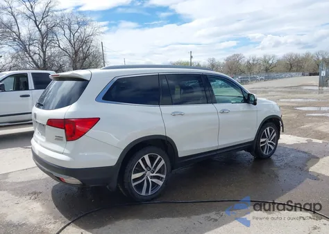 2017 Honda Pilot Touring z USA, uszkodzony, nr VIN 5FNYF6H99HB102367